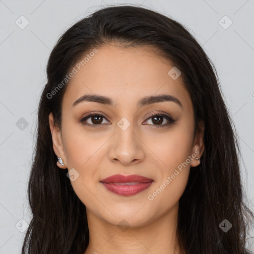 Joyful latino young-adult female with long  brown hair and brown eyes