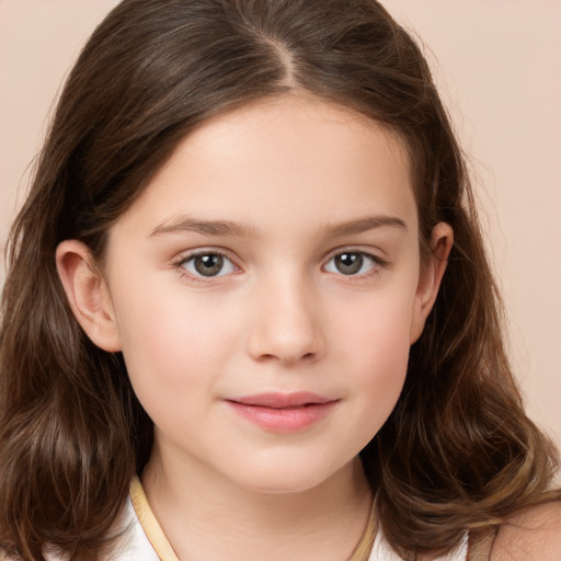 Joyful white child female with long  brown hair and brown eyes