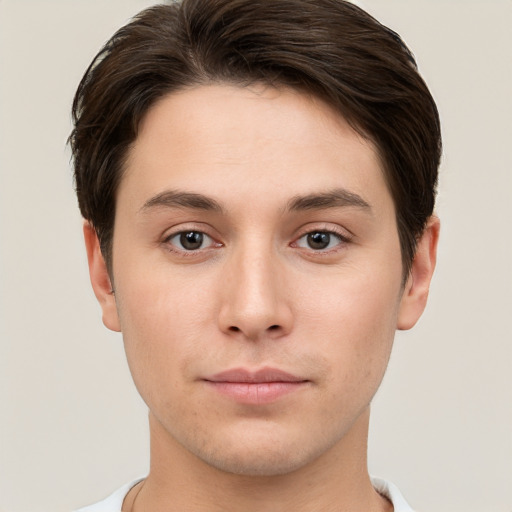 Neutral white young-adult male with short  brown hair and brown eyes