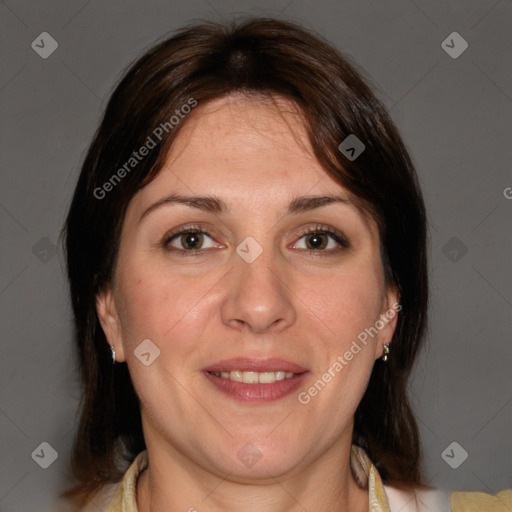 Joyful white adult female with medium  brown hair and brown eyes