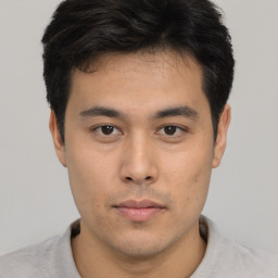 Neutral asian young-adult male with short  brown hair and brown eyes