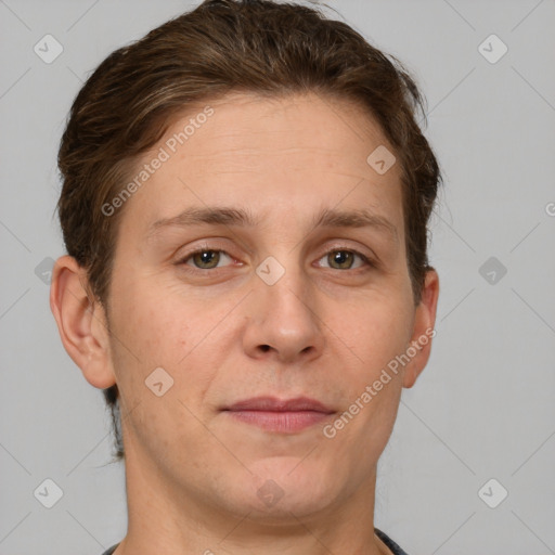 Joyful white adult male with short  brown hair and grey eyes