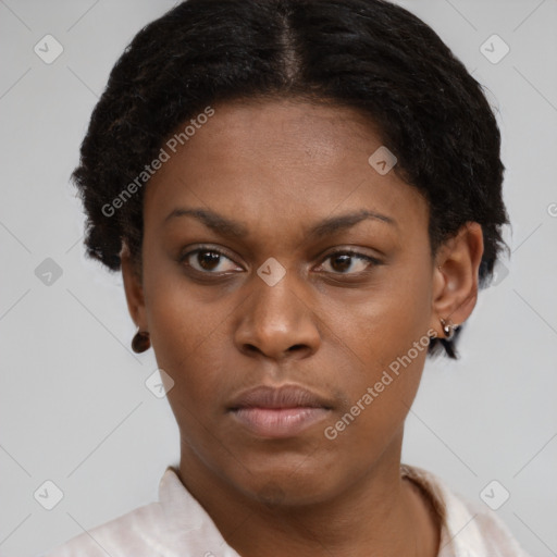 Neutral black young-adult female with short  brown hair and brown eyes