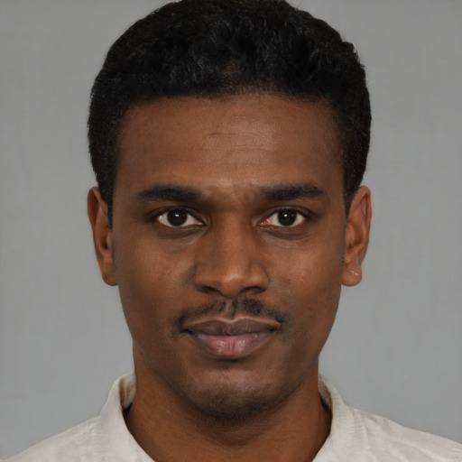 Neutral black young-adult male with short  black hair and brown eyes