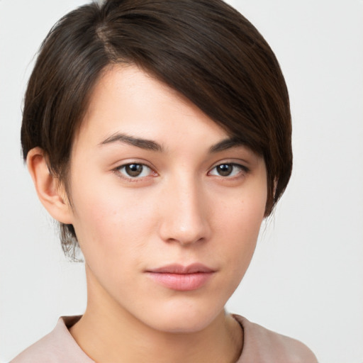 Neutral white young-adult female with short  brown hair and brown eyes