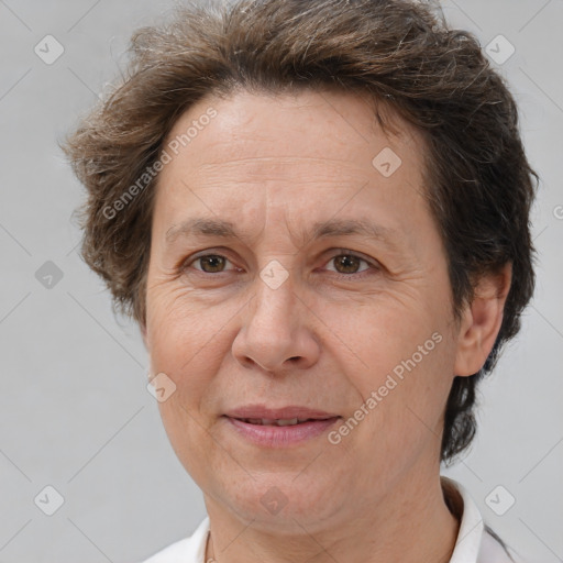 Joyful white middle-aged female with short  brown hair and brown eyes