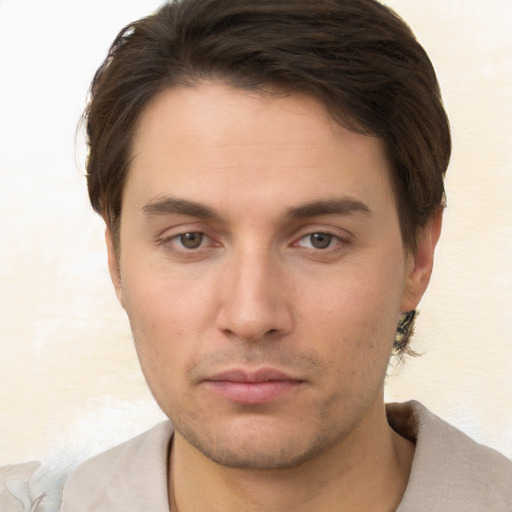 Neutral white young-adult male with short  brown hair and brown eyes