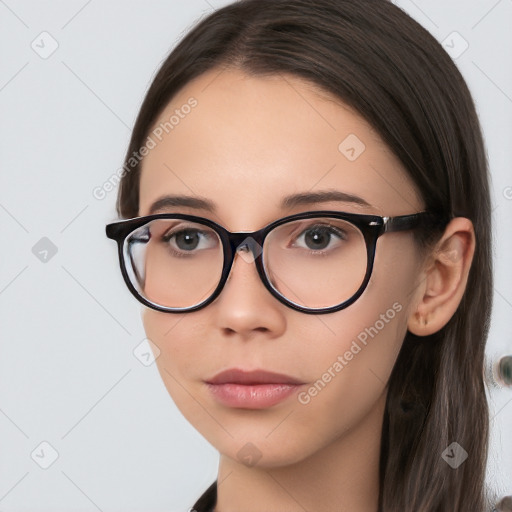 Neutral white young-adult female with long  brown hair and brown eyes