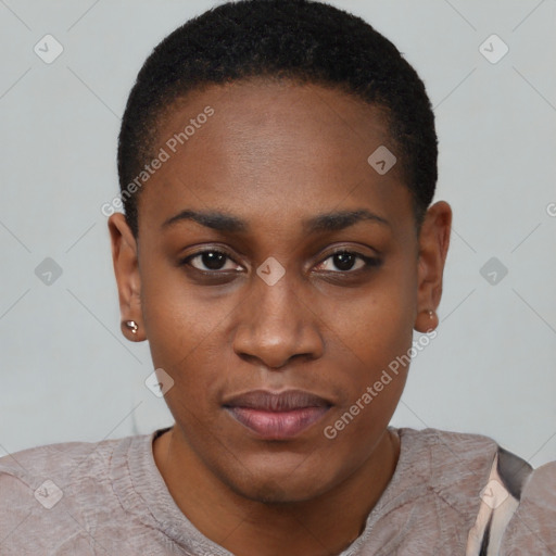 Joyful black young-adult female with short  black hair and brown eyes
