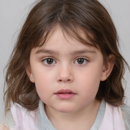 Neutral white child female with medium  brown hair and brown eyes