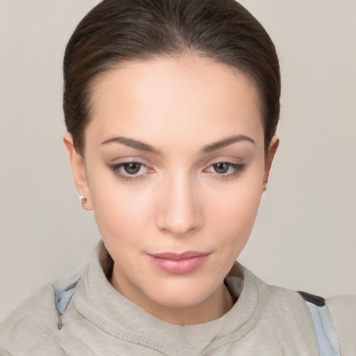 Neutral white young-adult female with short  brown hair and brown eyes