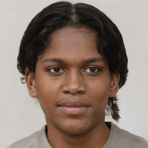 Neutral black young-adult female with short  brown hair and brown eyes