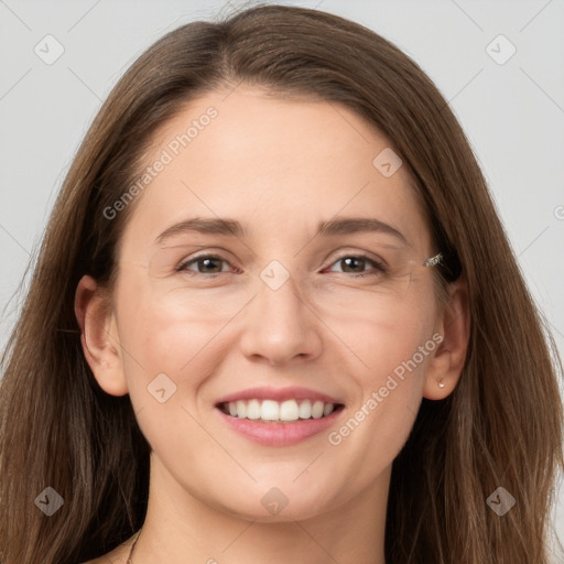 Joyful white young-adult female with long  brown hair and grey eyes