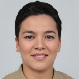 Joyful asian young-adult female with short  black hair and brown eyes