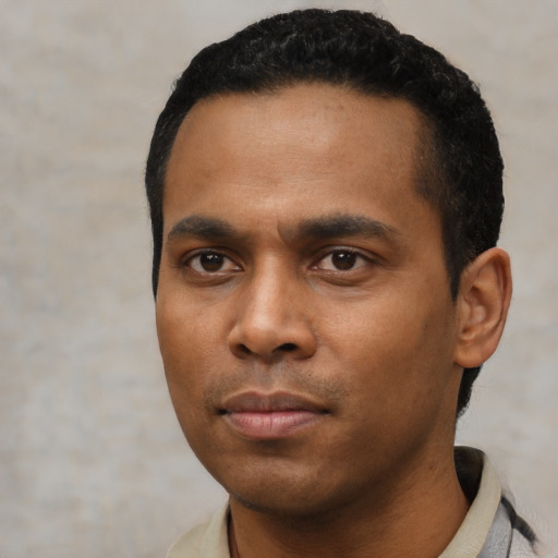 Neutral black young-adult male with short  black hair and brown eyes