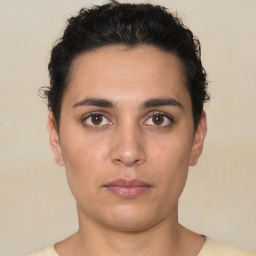 Neutral white young-adult female with short  brown hair and brown eyes