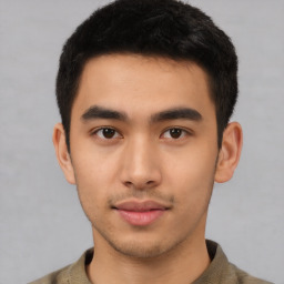 Neutral white young-adult male with short  black hair and brown eyes