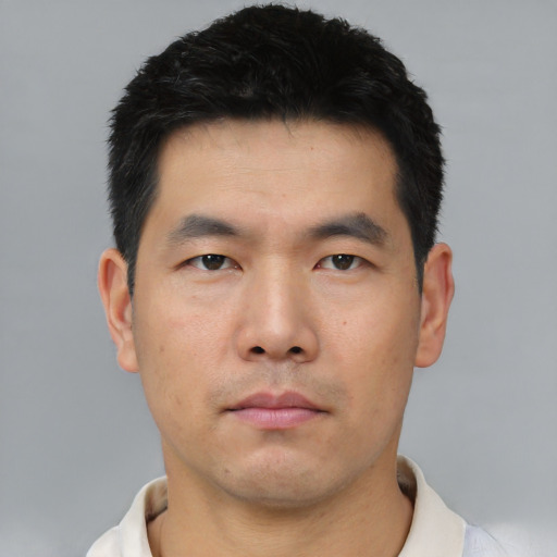 Neutral asian young-adult male with short  black hair and brown eyes