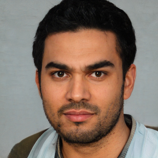 Neutral latino young-adult male with short  black hair and brown eyes