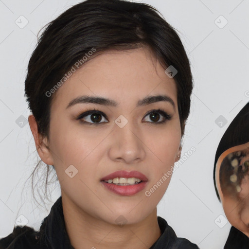 Joyful asian young-adult female with medium  brown hair and brown eyes