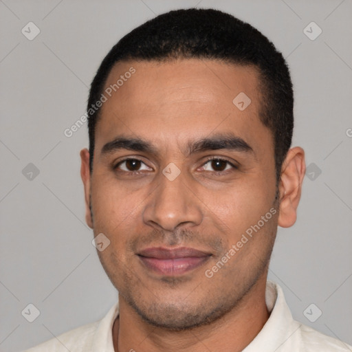 Joyful latino young-adult male with short  black hair and brown eyes