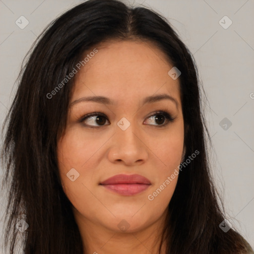 Joyful asian young-adult female with long  brown hair and brown eyes