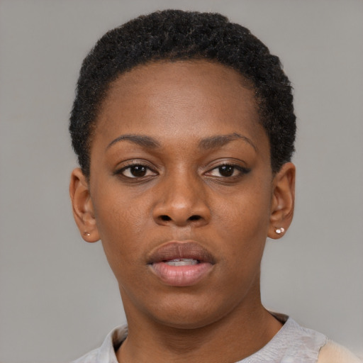 Neutral black young-adult female with short  black hair and brown eyes