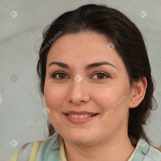 Joyful white young-adult female with medium  brown hair and brown eyes