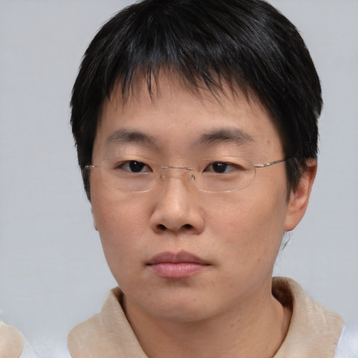 Neutral asian young-adult male with short  brown hair and brown eyes