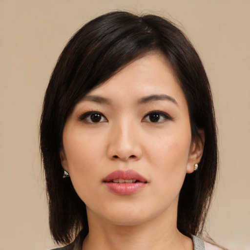 Neutral asian young-adult female with medium  black hair and brown eyes