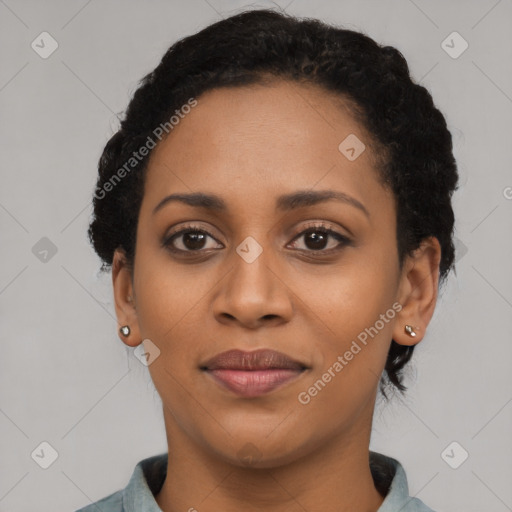 Joyful latino young-adult female with short  black hair and brown eyes