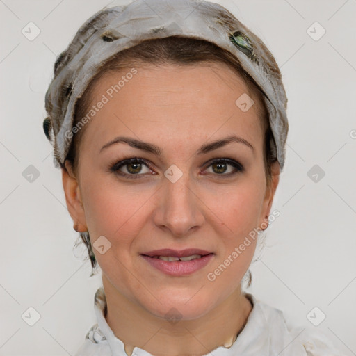 Joyful white adult female with short  brown hair and brown eyes