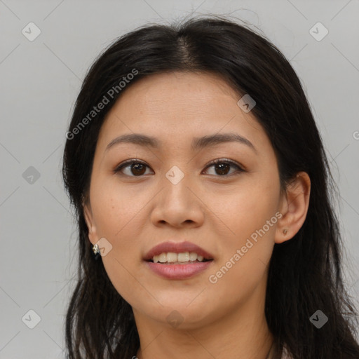 Joyful asian young-adult female with long  brown hair and brown eyes