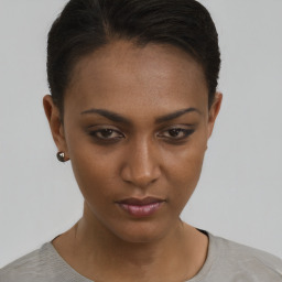 Neutral black young-adult female with short  brown hair and brown eyes