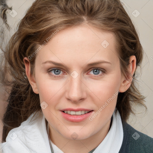 Joyful white young-adult female with medium  brown hair and blue eyes