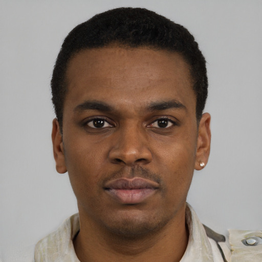 Neutral latino young-adult male with short  brown hair and brown eyes