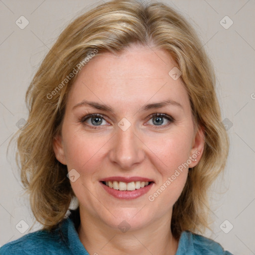 Joyful white young-adult female with medium  brown hair and blue eyes