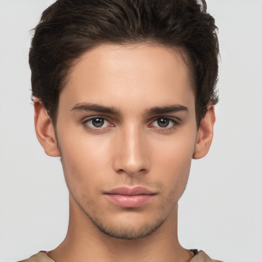 Neutral white young-adult male with short  brown hair and brown eyes