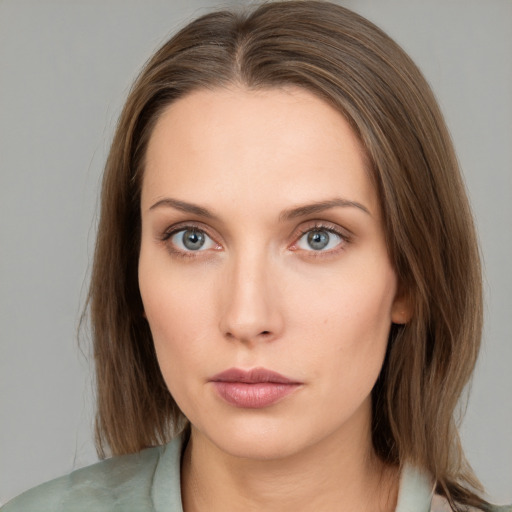 Neutral white young-adult female with medium  brown hair and grey eyes