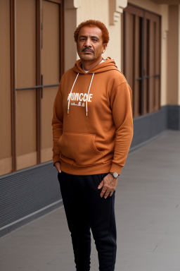 Moroccan middle-aged male with  ginger hair