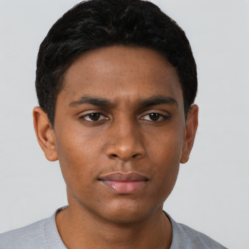 Neutral black young-adult male with short  brown hair and brown eyes