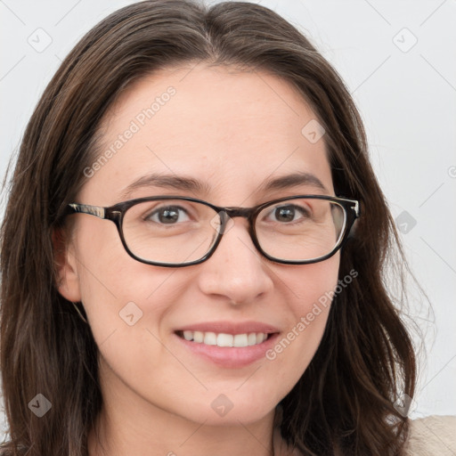 Joyful white young-adult female with long  brown hair and blue eyes