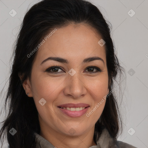 Joyful white adult female with long  brown hair and brown eyes