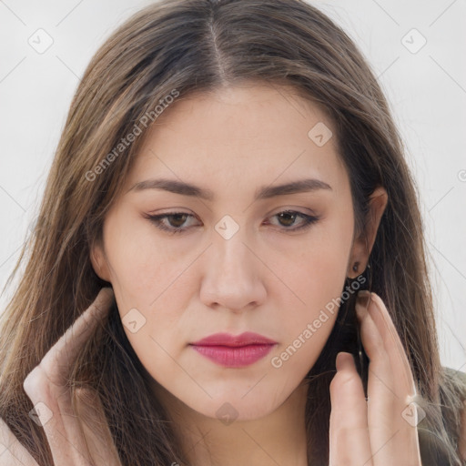 Neutral white young-adult female with long  brown hair and brown eyes