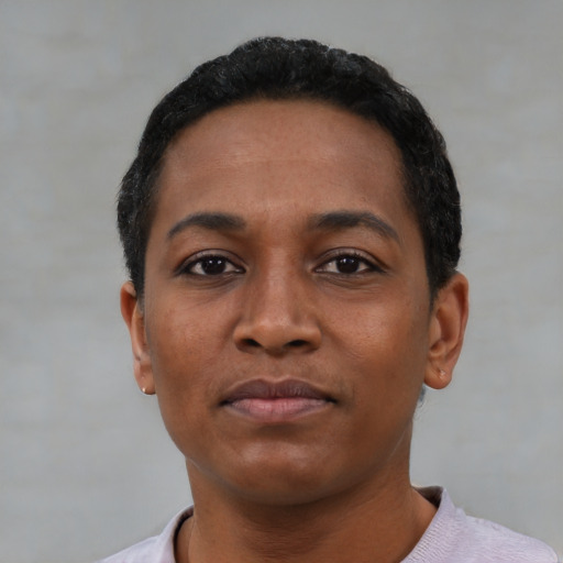Neutral black young-adult female with short  black hair and brown eyes
