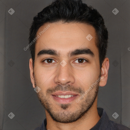 Joyful white young-adult male with short  black hair and brown eyes