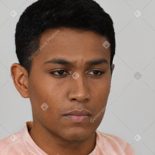 Neutral latino young-adult male with short  black hair and brown eyes