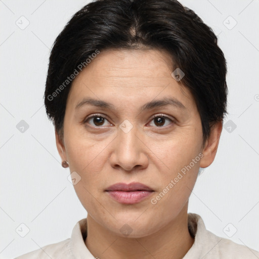 Joyful white adult female with short  brown hair and brown eyes