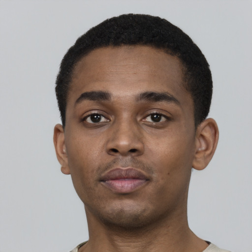 Neutral black young-adult male with short  black hair and brown eyes