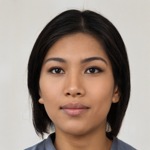 Neutral asian young-adult female with long  black hair and brown eyes